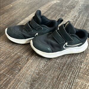 Nike Black and White Slip-On Sneakers with Elastic Strap